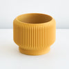 Mustard Cedar planter with a ribbed finish