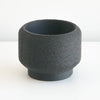 Black Cedar planter stacked on its matching saucer