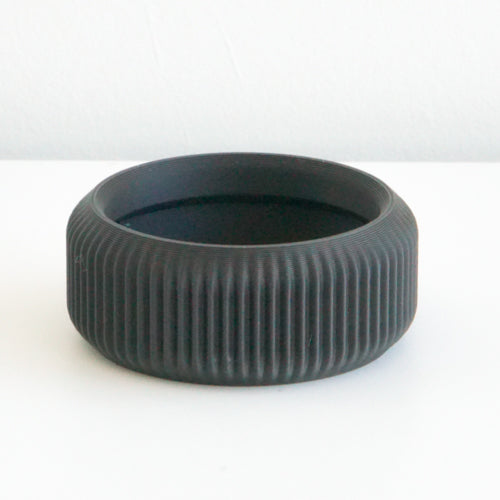 Black Cedar saucer with a ribbed finish