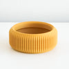 Mustard Cedar saucer with a ribbed finish