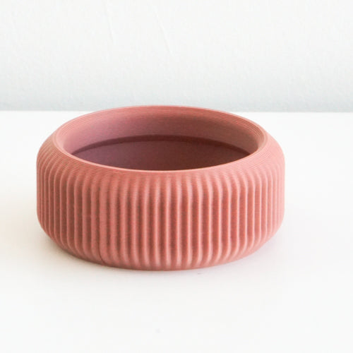 Salmon Cedar saucer with a ribbed finish