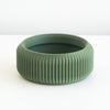Olive Cedar saucer with a ribbed finish