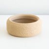 Tan Cedar saucer with a textured finish