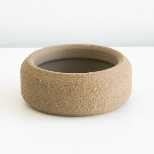 Mocha Cedar saucer with a textured finish