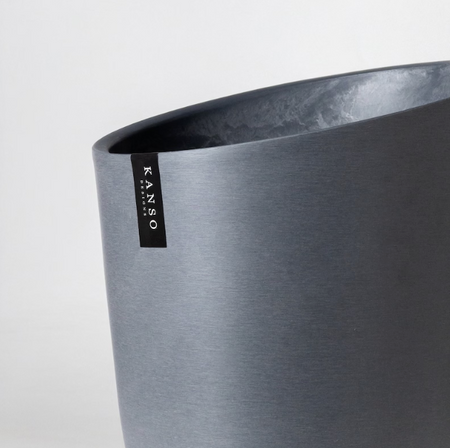 Tall dark grey angled planter
