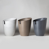 Three tall angled planters in white, taupe and grey