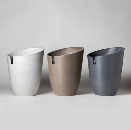 Three tall angled planters in white, taupe and grey