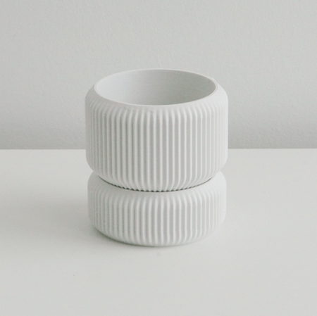 White Cedar planter stacked on its matching saucer