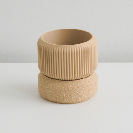 Tan Cedar planter stacked on its matching saucer