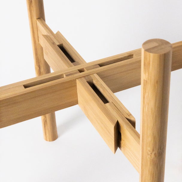 Close-up of the bamboo plant stand's cross joint