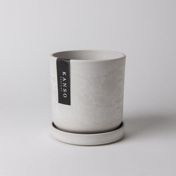 Empty white Signature Stone planter with matching tray